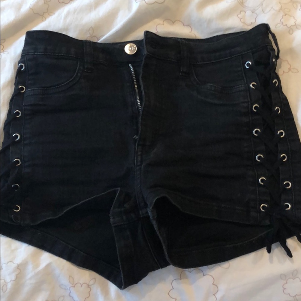 Black denim shorts with criss cross
